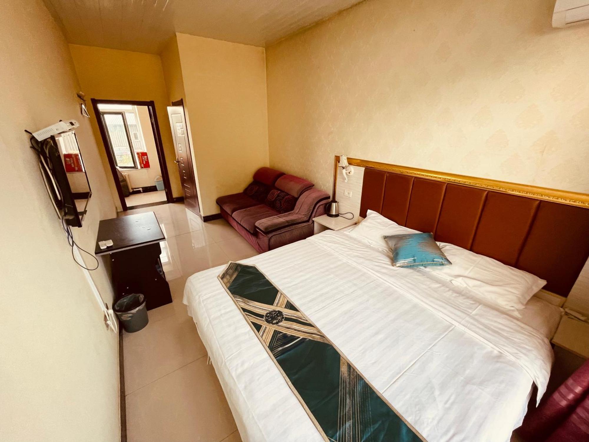 哈尔滨机场东方红运宾馆 Hotel Стая снимка