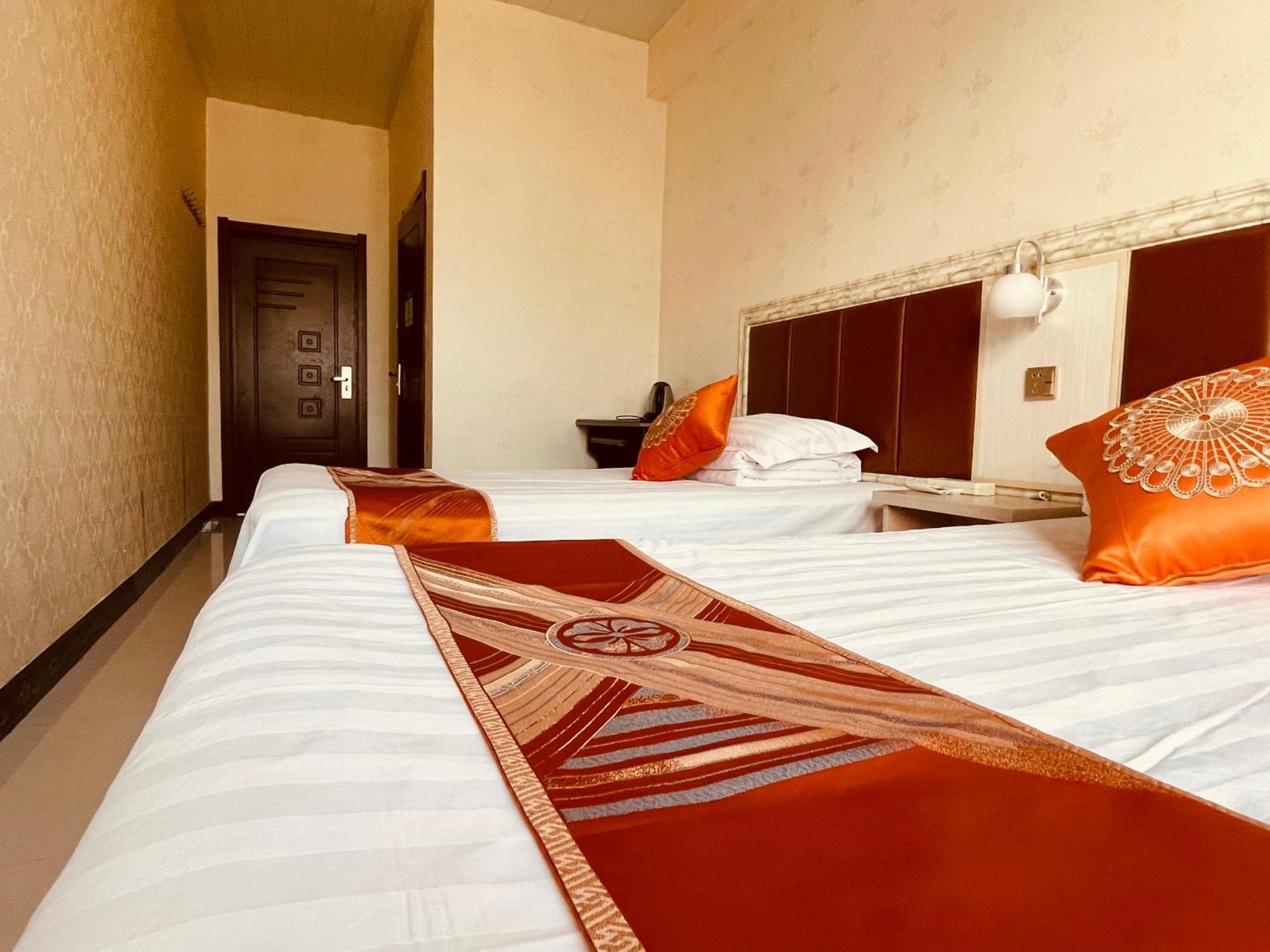 哈尔滨机场东方红运宾馆 Hotel Стая снимка