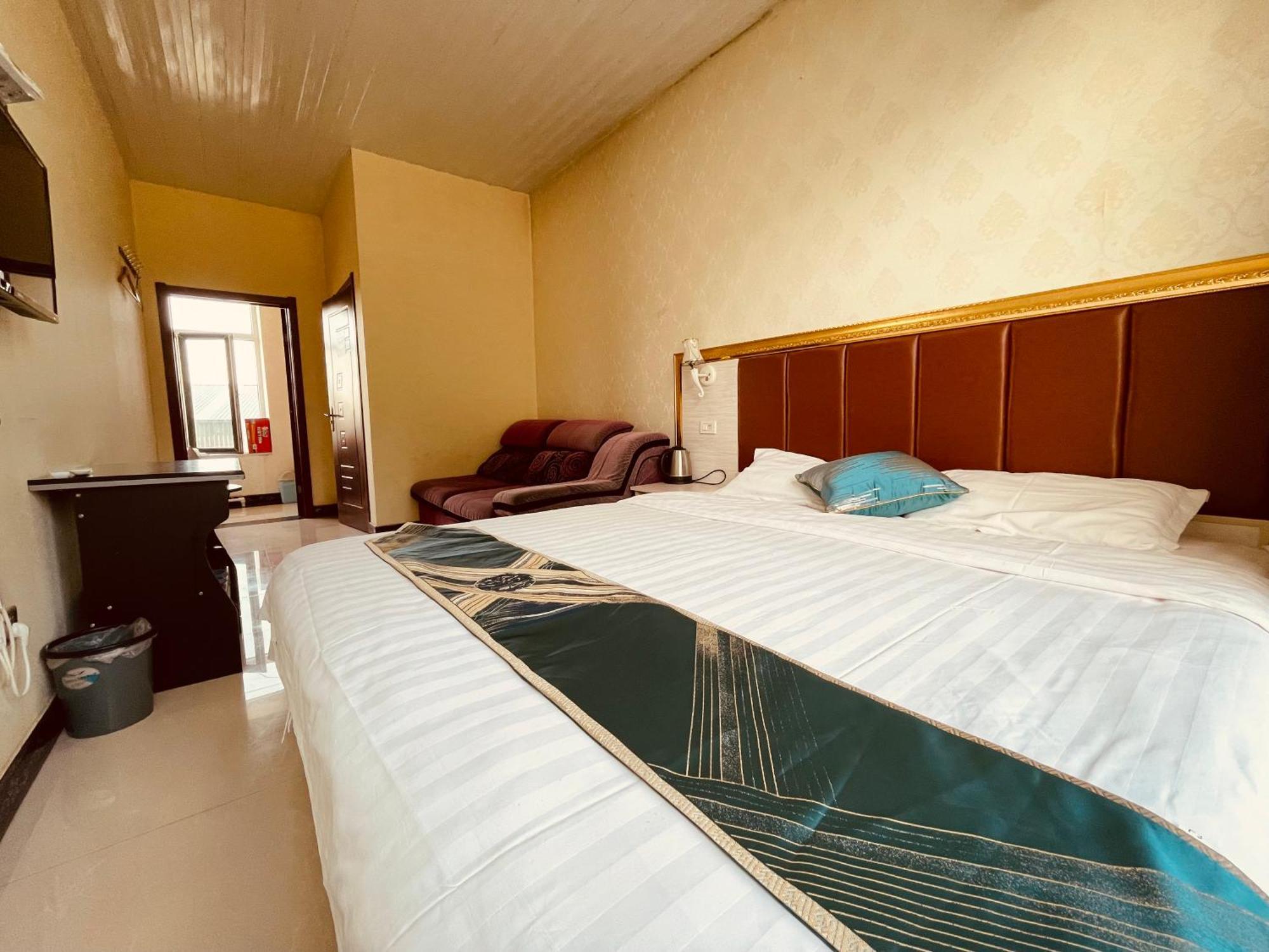哈尔滨机场东方红运宾馆 Hotel Стая снимка