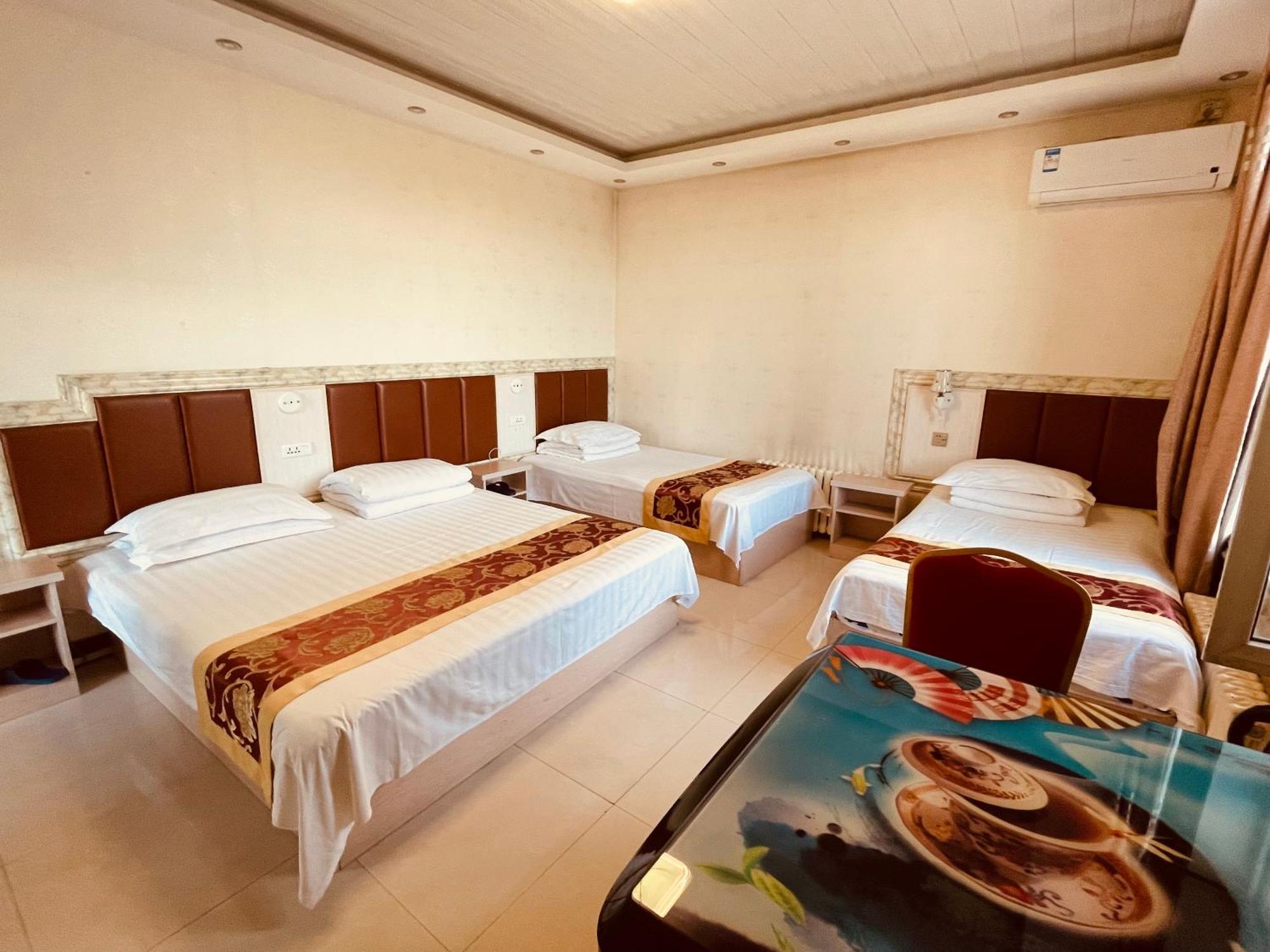 哈尔滨机场东方红运宾馆 Hotel Стая снимка