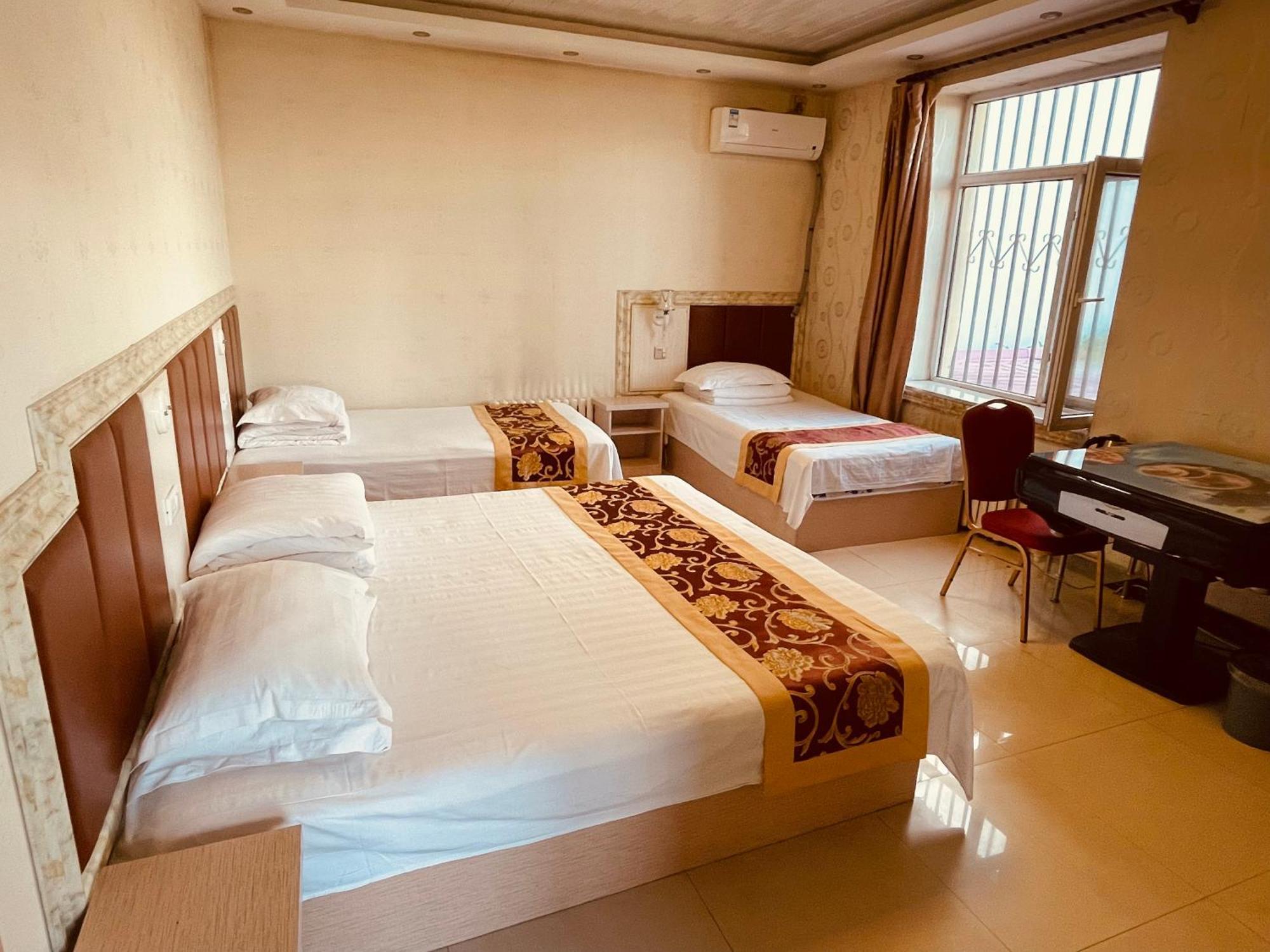 哈尔滨机场东方红运宾馆 Hotel Стая снимка