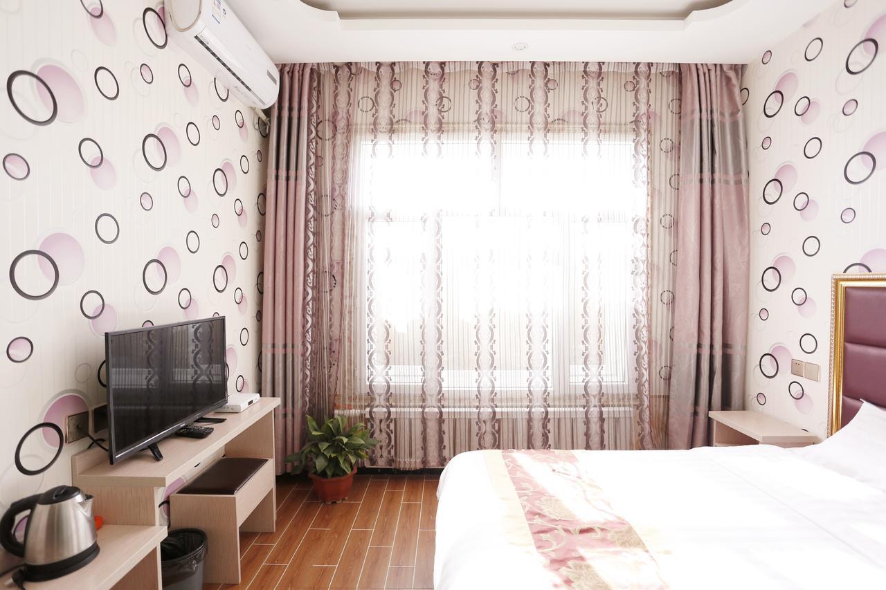 哈尔滨机场东方红运宾馆 Hotel Екстериор снимка